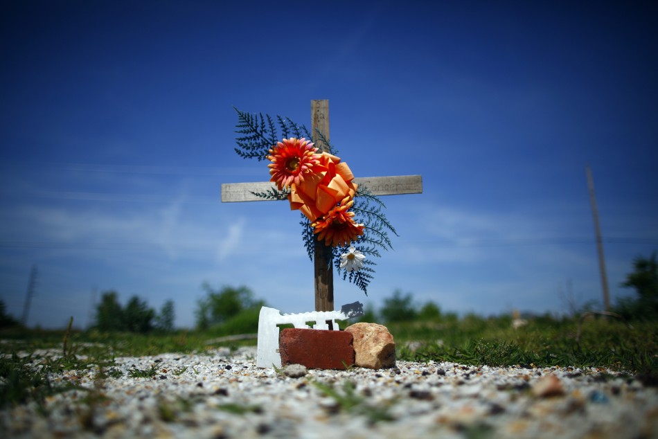 A memorial is seen where a house once stood in Joplin