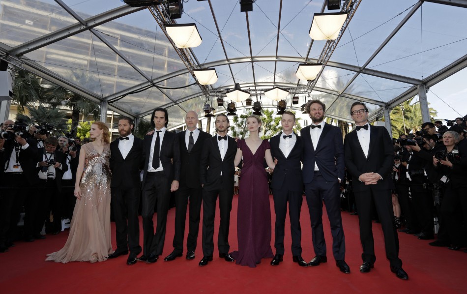 Director Hillcoat screenwriter Cave cast members Labeouf Dehaan and Chastain arrive on the red carpet for the screening of the film Lawless at the 65th Cannes Film Festival
