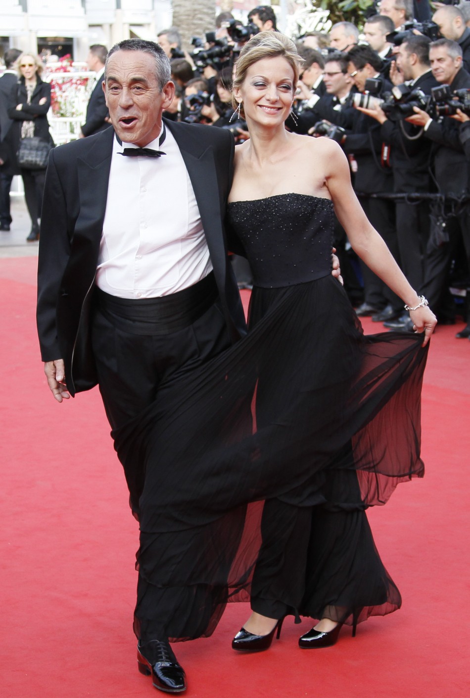 TV host Ardisson and his girlfriend Crespo-Mara arrive on the red carpet for the screening of the film Lawless in competition at the 65th Cannes Film Festival