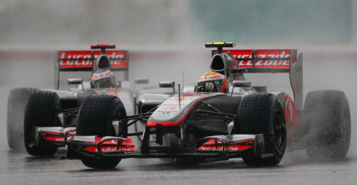 Lewis Hamilton (R) and Jenson Button