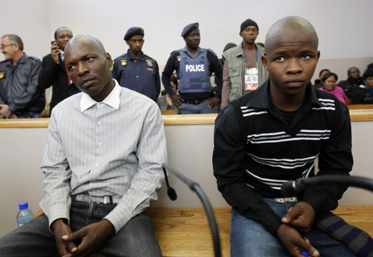 Mahlangu and Ndlovu look on during verdict hearing in Ventersdorp (Reuters)