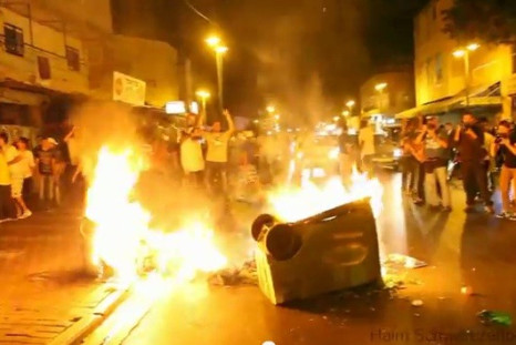 Violence surged in the streets of Tel Aviv as a 1000-strong protest against African immigrants seeking asylum in Israel turned violent.