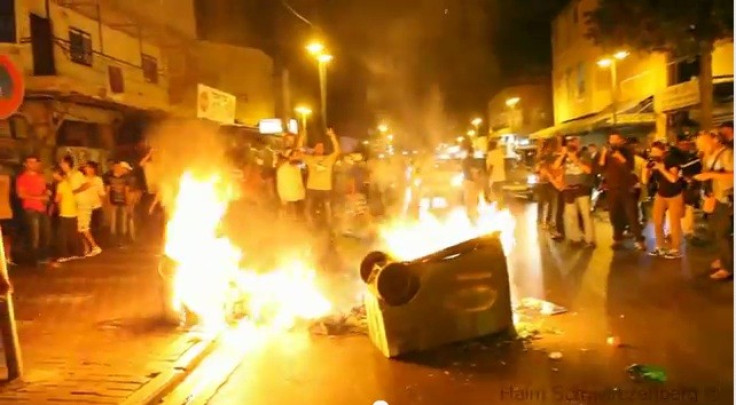 Violence surged in the streets of Tel Aviv as a 1000-strong protest against African immigrants seeking asylum in Israel turned violent.