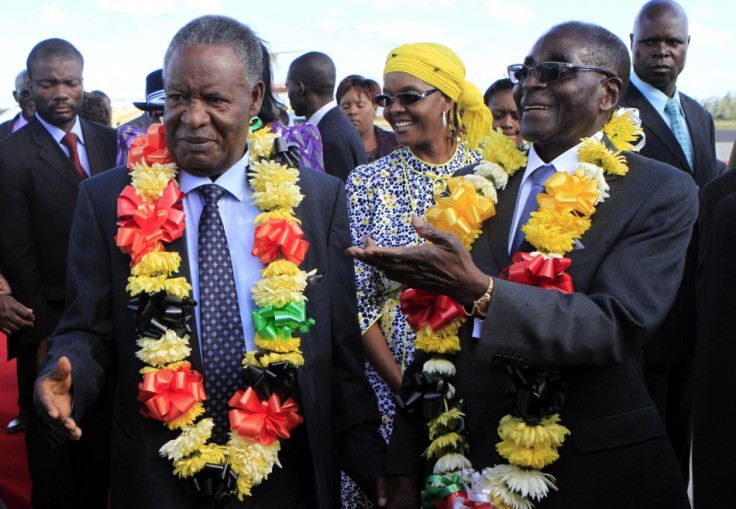 Zimbabwean President Robert Mugabe and his Zambian counterpart Michel Sata