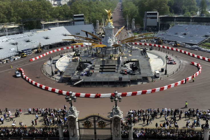 The Queen Victoria Memorial is prepared for Queen Elizabeth's Diamond Jubilee concert as seen from the roof of Buckingham Palace in London (Reuters)