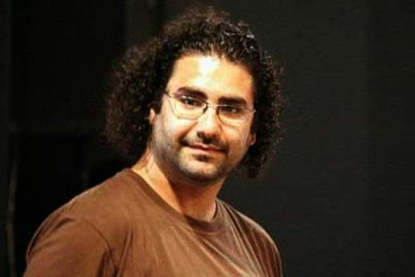 Egyptian activist Alaa Abdel-Fattah has been accused of involvement in a fire that damaged presidential candidate Ahmed Shafiq