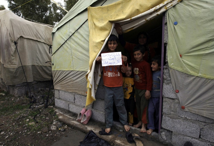 Syrian refugees of Kurdish origin have been flooding across the border into Iraq