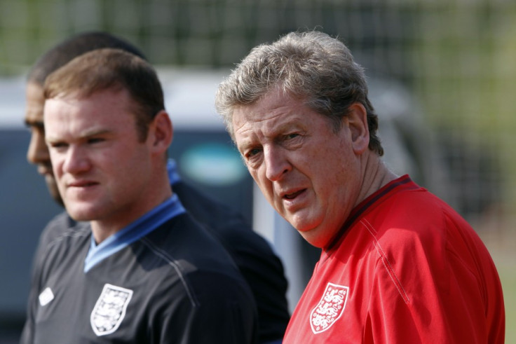 Roy Hodgson and Wayne Rooney