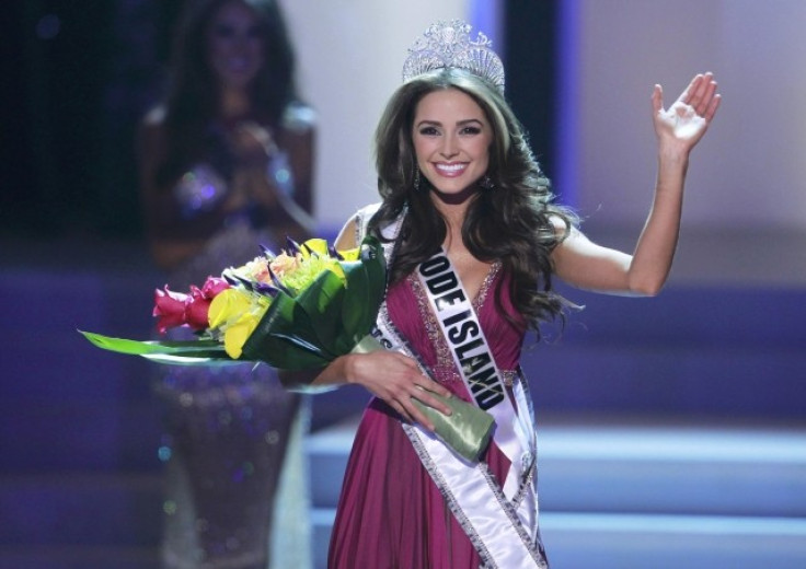 Miss Rhode Island Olivia Culpo waves after being crowned during the Miss USA pageant at the Planet Hollywood Resort