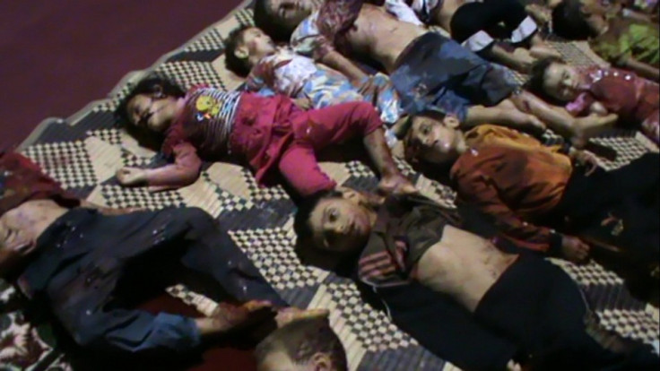 Bodies of children spread out on ground in Huola after being killed by government security forces, according to anti-government protesters Bodies of children spread out on ground in Huola after being killed by government security forces, according to anti-government protesters