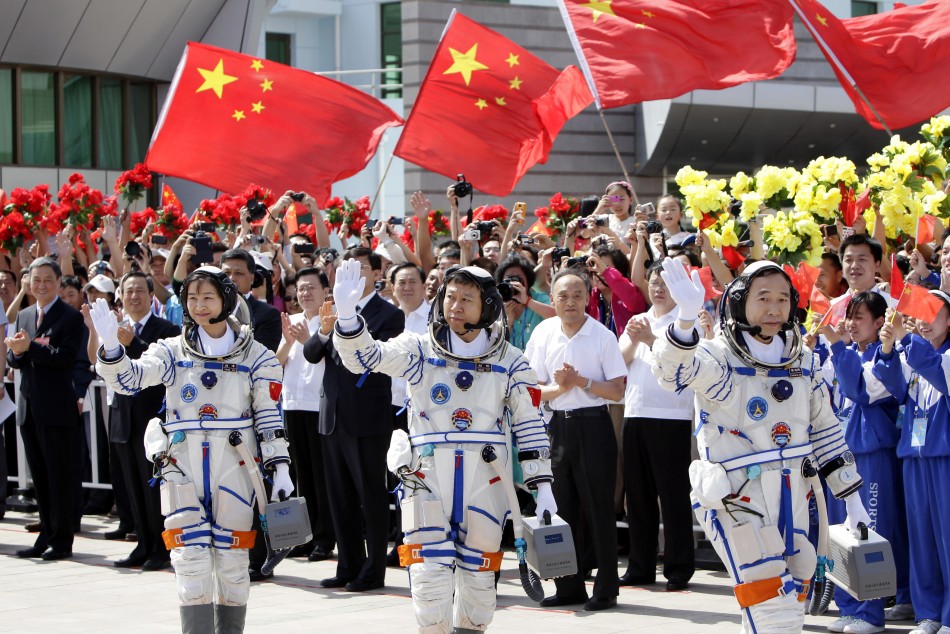Chinese astronauts Jing Haipeng, Liu Wang and Liu Yang