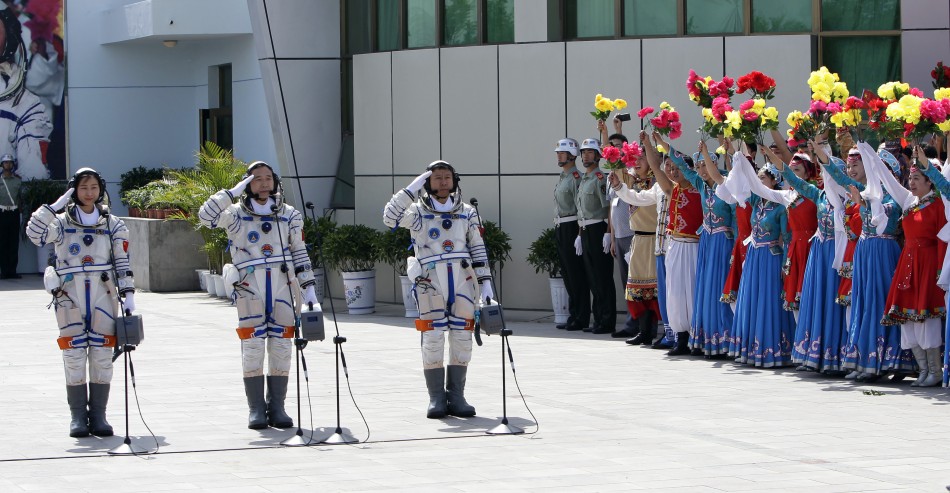 Chinese astronauts Jing Haipeng, Liu Wang and Liu Yang