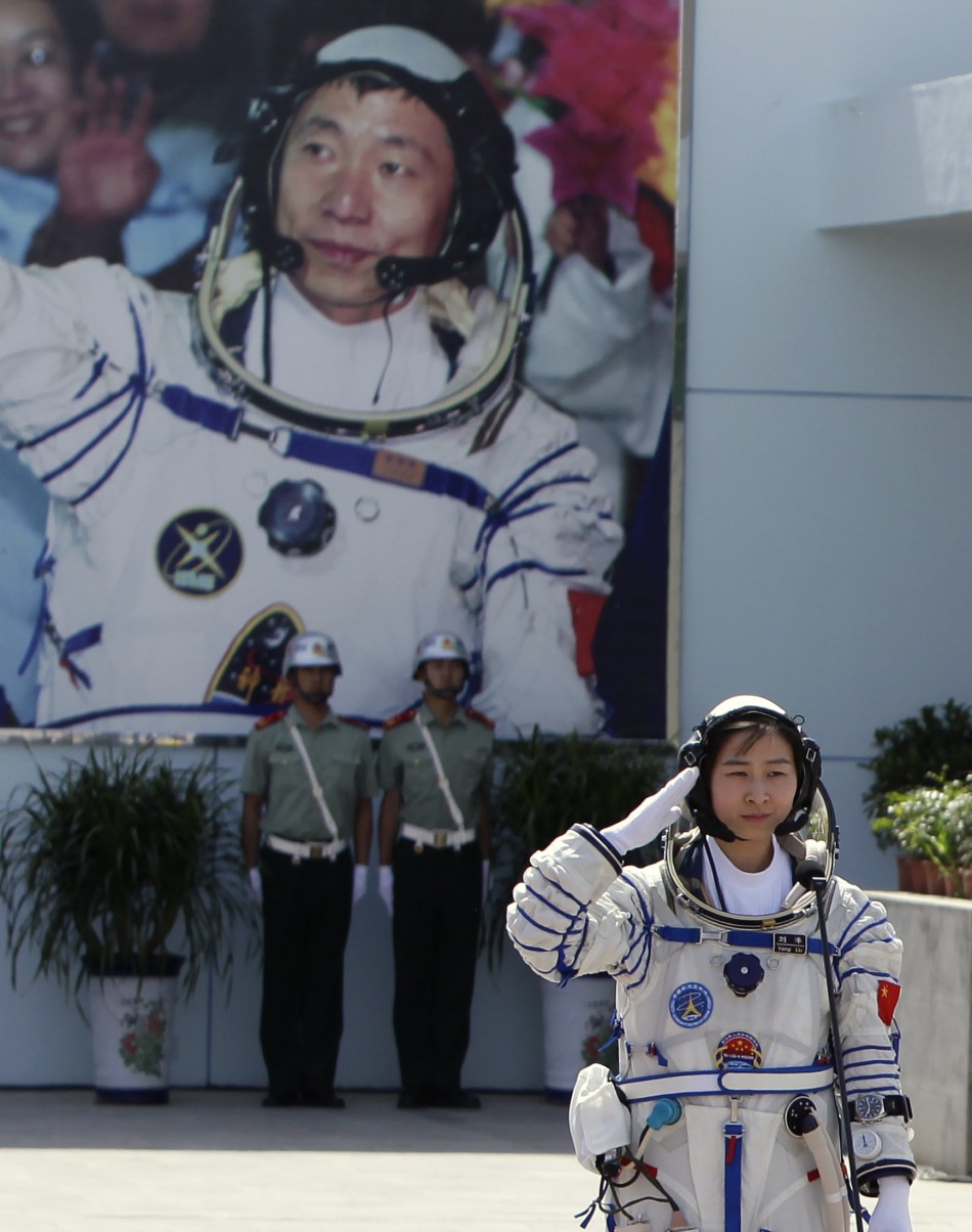 Chinas first female astronaut Liu Yang salutes