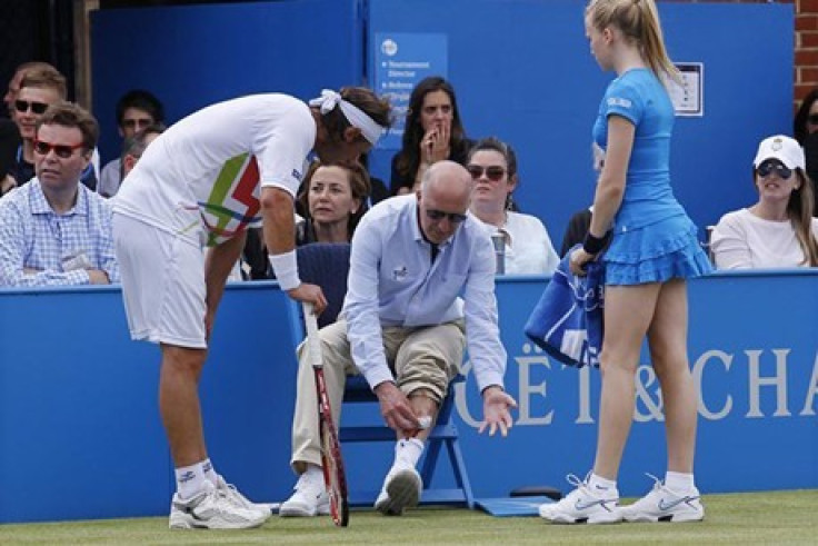David Nalbandian will be investigated by police after injuring line judge (Reuters)