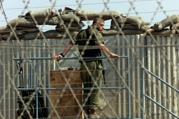 ISRAELI SOLDIER AT POST ON GREEN LINE IN BAT HEFER.