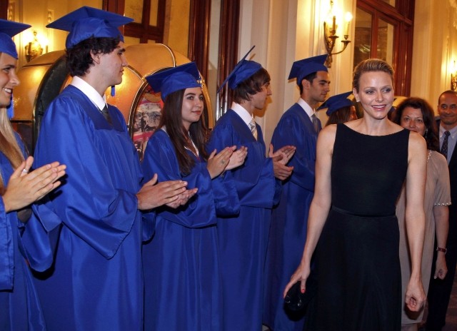 Princess Charlene Enlivens a Graduation Gala in Monte Carlo in Sleek Black Dress