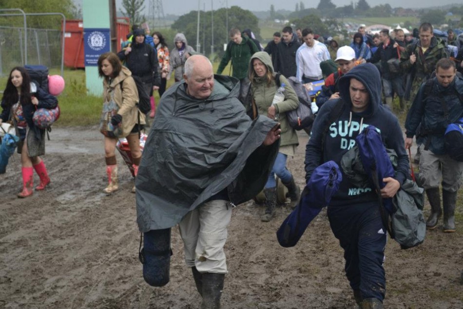 People trapped in mud and rain at the Isle of Wight festival