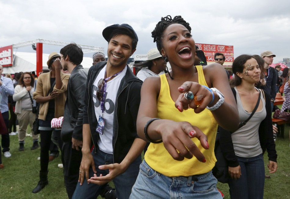 Festival goers dance during a DJ set at the Hackney Weekender festival at Hackney Marshes in east London