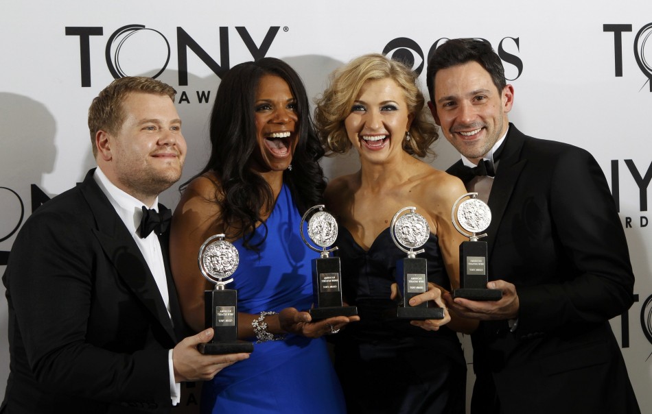 James Corden, Audra McDonald, Nina Arianda, and Steve Kazee pose backstage with their awards during the American Theatre Wings 66th annual Tony Awards in New York