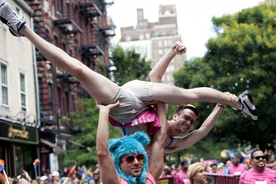 Marchers participate in the Gay Pride Parade in New York