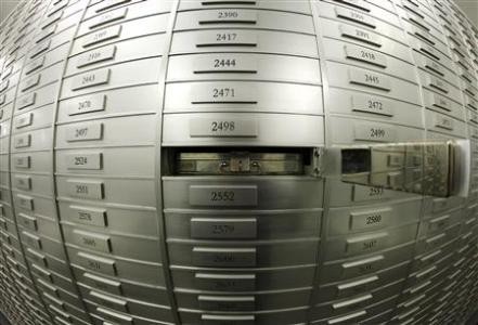 Nervous investors fill Swiss safes with cash, gold