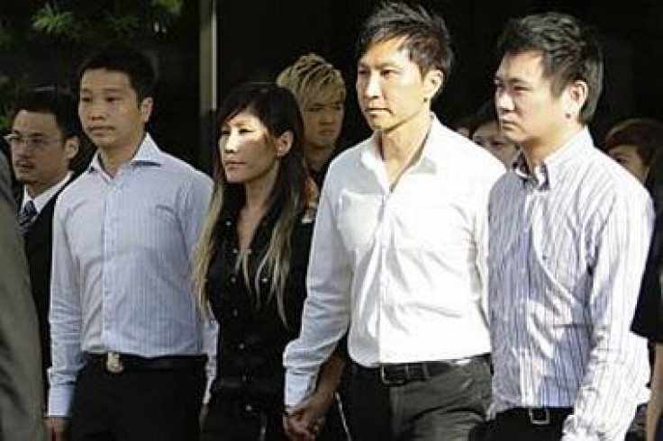 Kong Hee (second right) with his singer wife Ho Yeow Sun, known professionally as Sun Ho (Reuters)