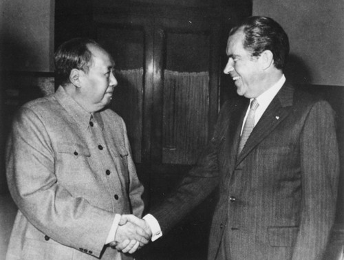 Former  U.S. President Richard Nixon, with Chinese Communist leader Mao Zedong.
