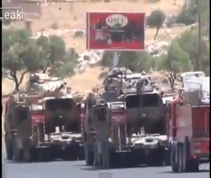 Turkey's state television said the country is deploying anti-aircraft weapons along the Syrian border.