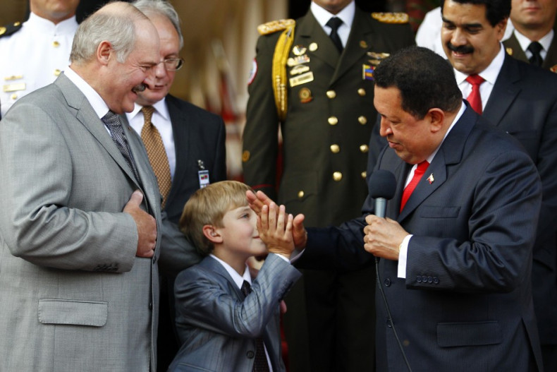 Nikolai Lukashenko flanked by his father and Venezuela's Hugo Chavez