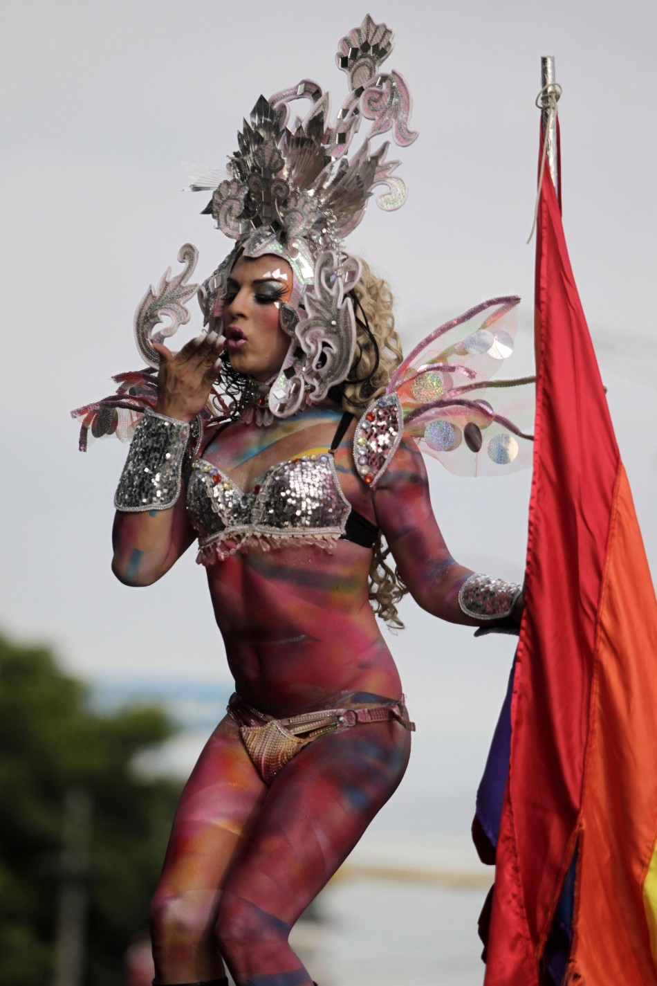 A member of the LGBT community takes part in a gay pride parade in Managua, capital of Nicaragua