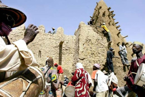 Hard-line Islamists, who have occupied the whole of northern Mali, have in two days armed with Kalashnikovs and pick-axes, smashed seven ancient tombs in Timbuktu, Reuters