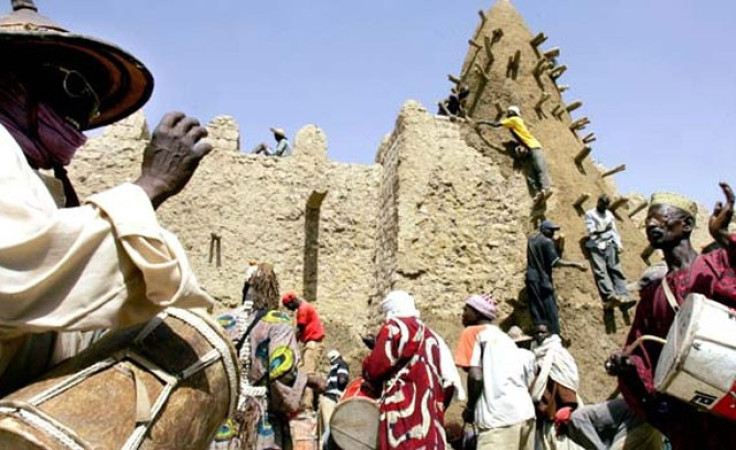 Hard-line Islamists, who have occupied the whole of northern Mali, have in two days armed with Kalashnikovs and pick-axes, smashed seven ancient tombs in Timbuktu, Reuters