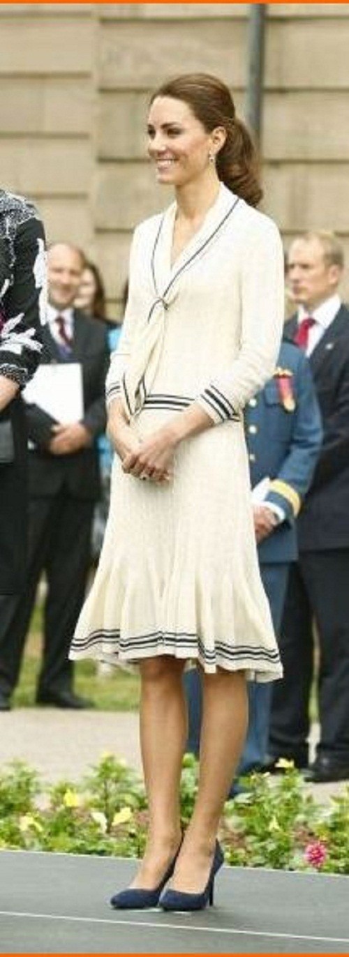 Kate Middleton wore the same cream knit Alexander McQueen dress, which she wore to Province House in Charlottetown, Prince Edward Island L in July 2011.
