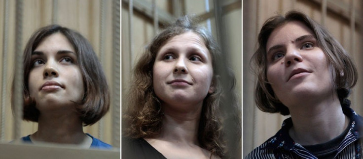 Pussy Riot members Nadezhda Tolokonnikova, Maria Alekhina and Yekaterina Samutsevich  are charged with hooliganism (Reuters)