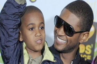 Usher Raymond and his stepson Kile Glover