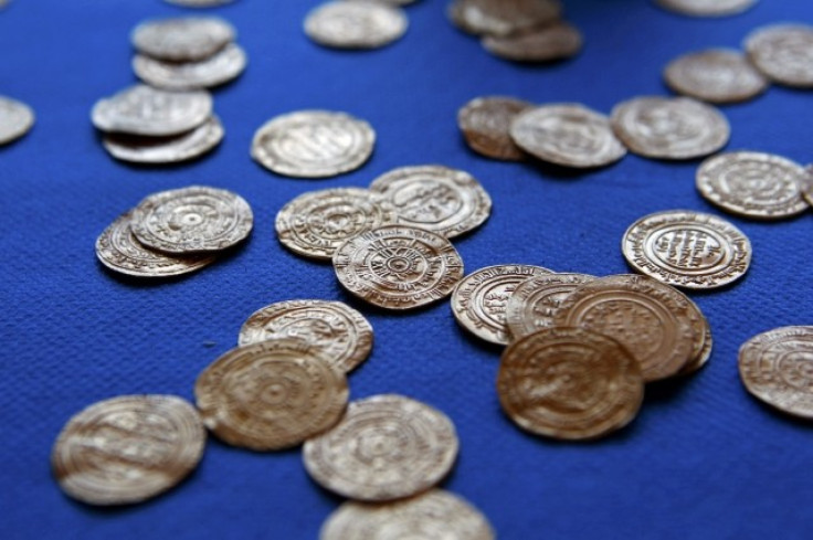 Gold coins which were unearthed during excavations at a Crusader fortress, are displayed near Herzliya. (Photo: REUTERS)