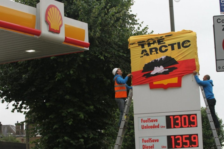 Activists have shut down Shell petrol stations in London and Edinburgh ( Elizabeth Dalziel/Greenpeace)