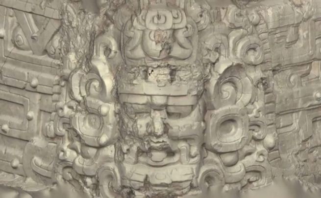 Screen shot of a video shows stucco masks, depicting several celestial beings, including the sun on the walls of the temple. (Photo: Brown University)