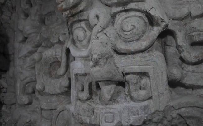 Screen shot of a video shows stucco masks, depicting several celestial beings, including the sun on the walls of the temple. (Photo: Brown University)