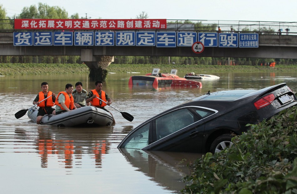 Beijing Floods Kill 37, Millions Affected by Rainfall Deluge [PHOTOS/VIDEO]
