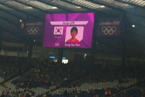 North Korea players were introduced on large screens alongside the South Korea flag of their bitter enemies.