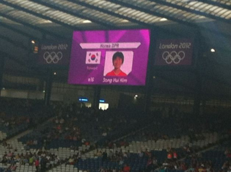 North Korea players were introduced on large screens alongside the South Korea flag of their bitter enemies.
