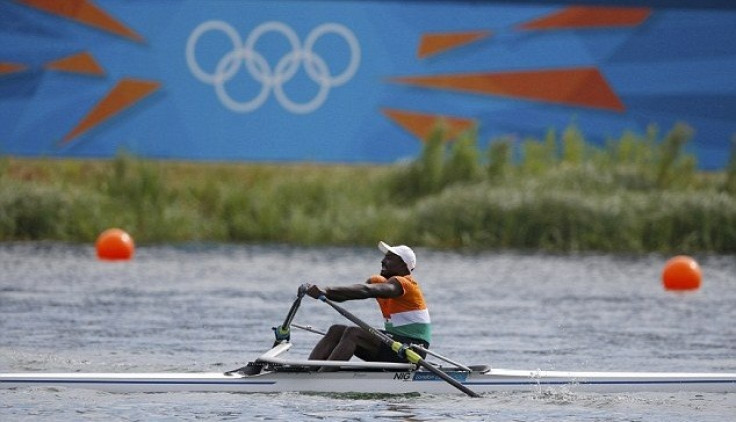 Niger's Hamadou Djibo Issaka rows in the men's single sculls repechage at Eton Dorney during the London 2012 Olympic Games
