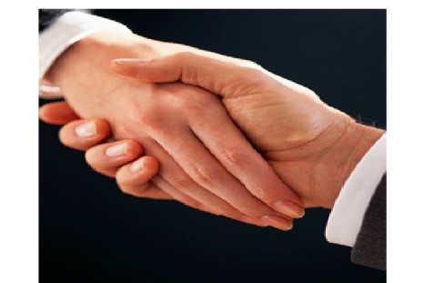 A handshake between two business partners