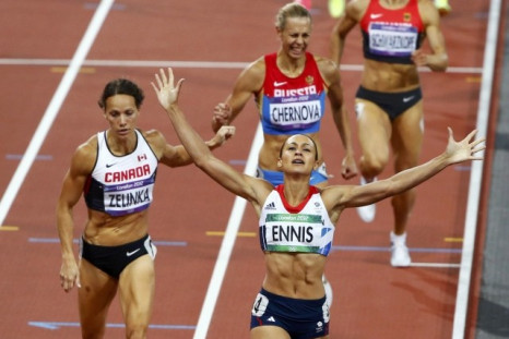 Ennis crosses the finish line first to win the 800m of the heptathlon