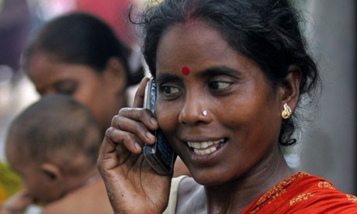 Woman using mobile phone.