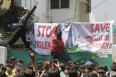Muslim activists protest outside the Myanmar embassy in Jakarta