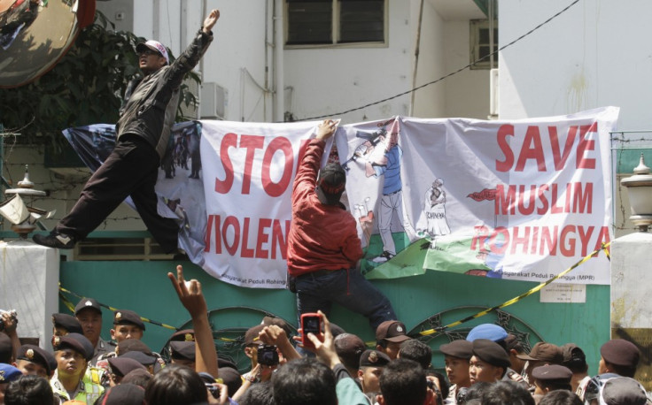 Muslim activists protest outside the Myanmar embassy in Jakarta
