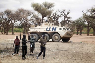An UNAMID Armored Personnel Carrier from the Nepalese Special Forces patrols Kutum, Reuters