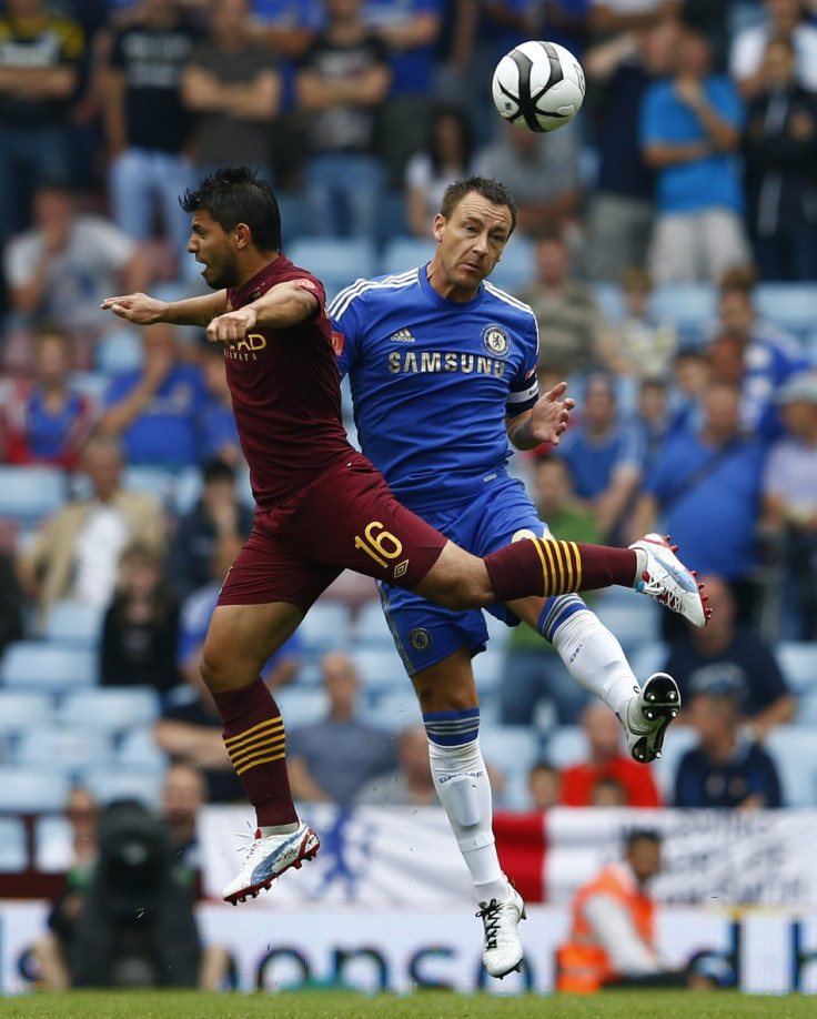 Manchester City's Sergio Aguero (L)